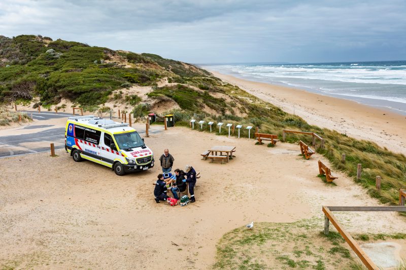 Ambulance Victoria attending to a patient on the beach