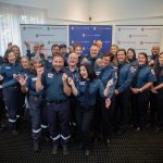 A group of paramedics celebrating.