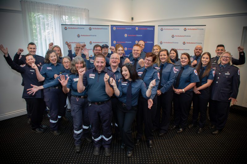 A group of paramedics celebrating.